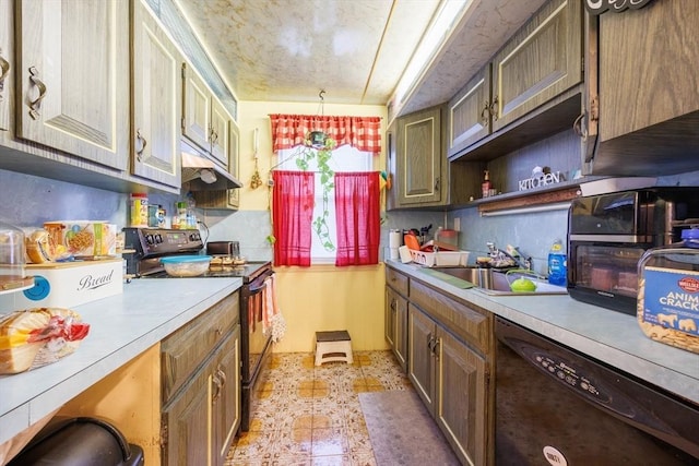 1-3 Fairoaks Ave, Methuen, MA 01844 - kitchen featuring black appliances, under cabinet range hood, a sink, and light countertops