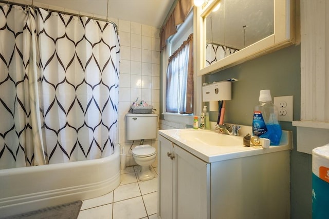 1-3 Fairoaks Ave, Methuen, MA 01844 - full bath featuring tile patterned flooring, tile walls, vanity, shower / bath combination with curtain, and toilet