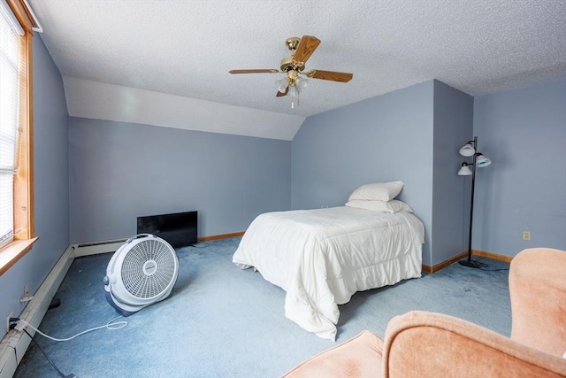 1-3 Fairoaks Ave, Methuen, MA 01844 - carpeted bedroom featuring baseboards, a ceiling fan, vaulted ceiling, a baseboard radiator, and a textured ceiling