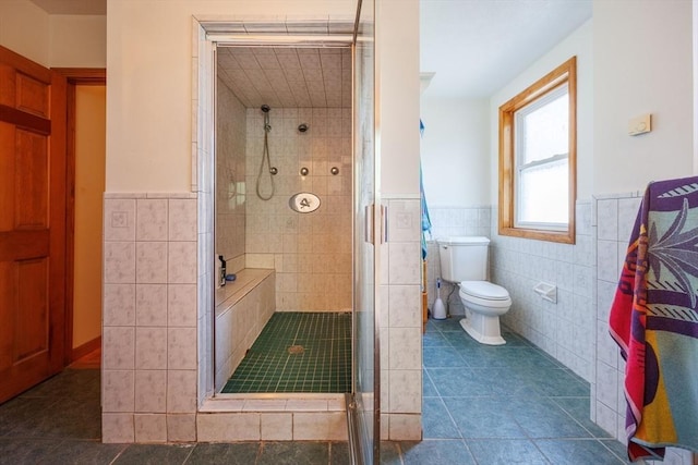 1-3 Fairoaks Ave, Methuen, MA 01844 - full bath featuring tile walls, a stall shower, a wainscoted wall, tile patterned flooring, and toilet