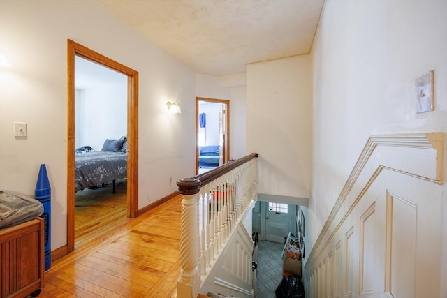 1-3 Fairoaks Ave, Methuen, MA 01844 - hall featuring an upstairs landing, light wood finished floors, and baseboards