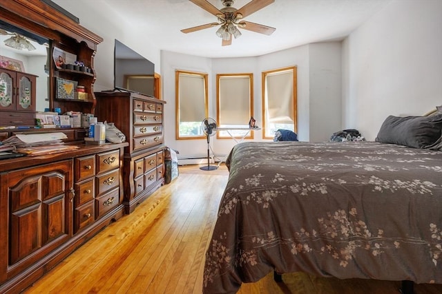 1-3 Fairoaks Ave, Methuen, MA 01844 - bedroom featuring light wood-style flooring, baseboard heating, and ceiling fan