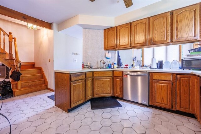 1-3 Fairoaks Ave, Methuen, MA 01844 - kitchen featuring dishwasher, a sink, brown cabinets, light countertops, and light tile patterned floors