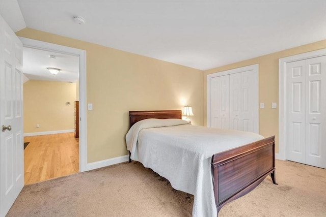 80 Schooner Ln, Barnstable, MA 02601 - bedroom with light carpet, vaulted ceiling, and baseboards