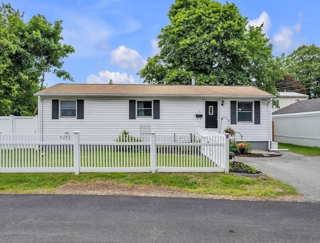 5 Arcadia Ave, Johnston, RI 02919 - view of front of house with a fenced front yard