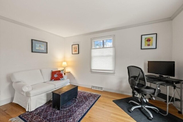 307 Riverview Dr, Chatham, MA 02633 - office area featuring wood finished floors, visible vents, crown molding, and baseboards