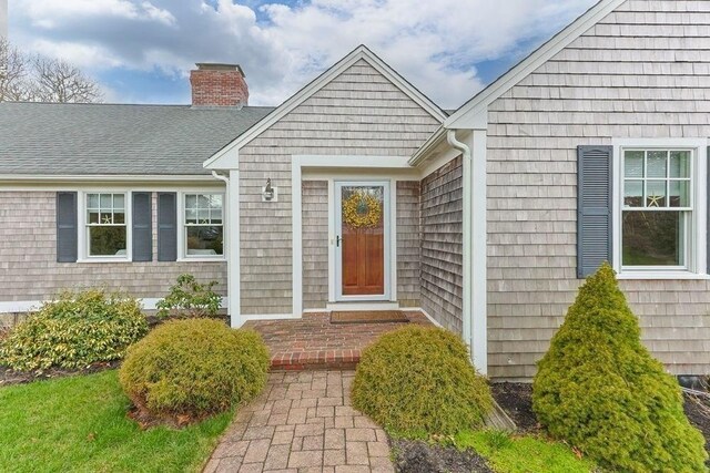 307 Riverview Dr, Chatham, MA 02633 - doorway to property featuring a chimney