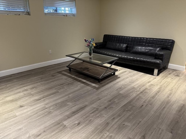 127 Sumner St, Milton, MA 02186 - living area with baseboards and wood finished floors