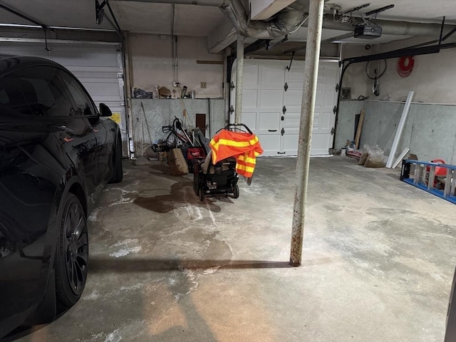 127 Sumner St, Milton, MA 02186 - garage featuring a garage door opener