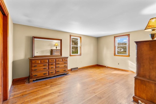 bedroom featuring light wood-type flooring