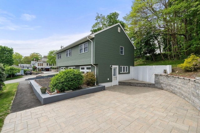 152 Audubon Ave, Braintree, MA 02184 - view of side of property featuring a patio area