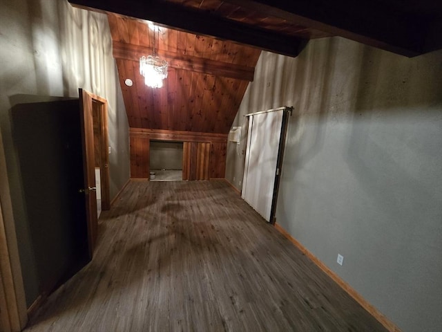 hallway with vaulted ceiling with beams, wooden ceiling, and hardwood / wood-style floors