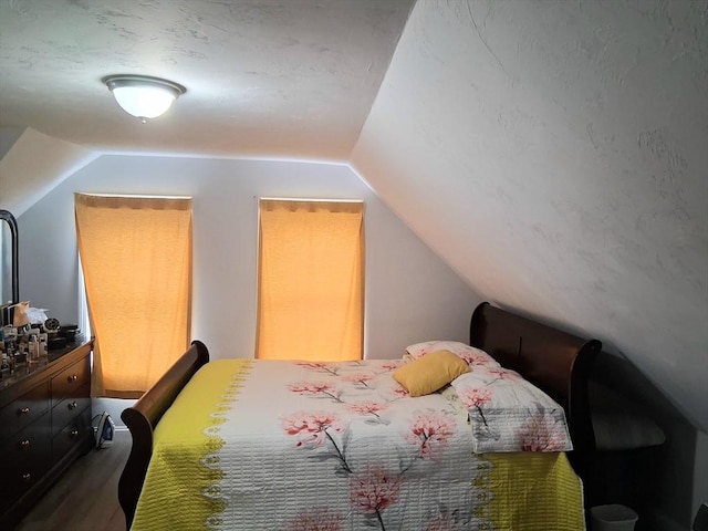 23 Barry St, Brockton, MA 02302 - bedroom with vaulted ceiling and dark wood-type flooring