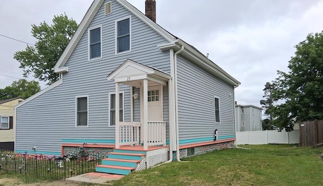 23 Barry St, Brockton, MA 02302 - view of front facade with a chimney