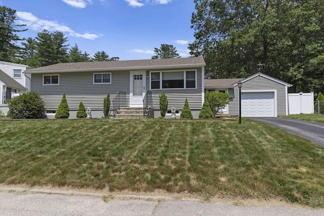 2 Wedgewood Rd, Dover, NH 03820 - view of front of home featuring asphalt driveway and a garage