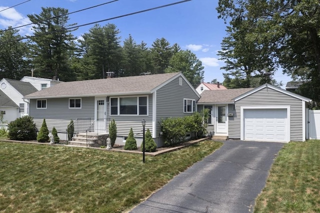 2 Wedgewood Rd, Dover, NH 03820 - single story home with a front yard, asphalt driveway, an attached garage, and a shingled roof