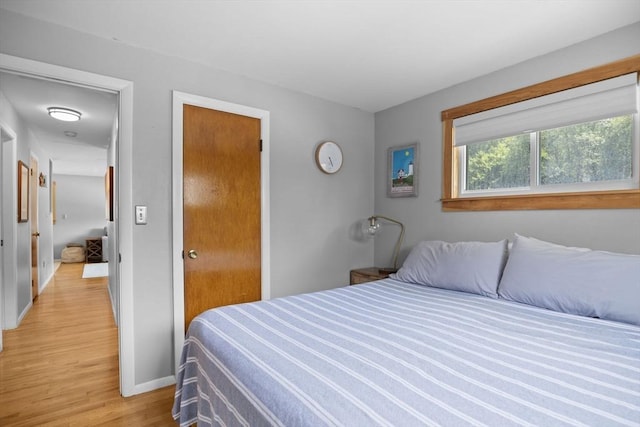 2 Wedgewood Rd, Dover, NH 03820 - bedroom with light wood-style flooring and baseboards