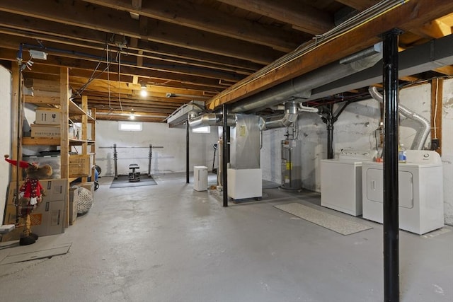 2 Wedgewood Rd, Dover, NH 03820 - below grade area featuring water heater, washer and dryer, and heating unit
