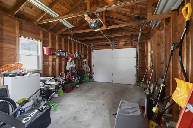 2 Wedgewood Rd, Dover, NH 03820 - garage with a garage door opener and wooden walls
