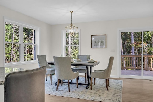 L-244 Doyle Ave, Winchendon, MA 01475 - dining space with wood finished floors and a chandelier