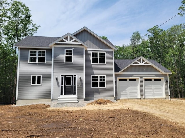 L-244 Doyle Ave, Winchendon, MA 01475 - view of front of home featuring driveway, a shingled roof, a garage, and entry steps