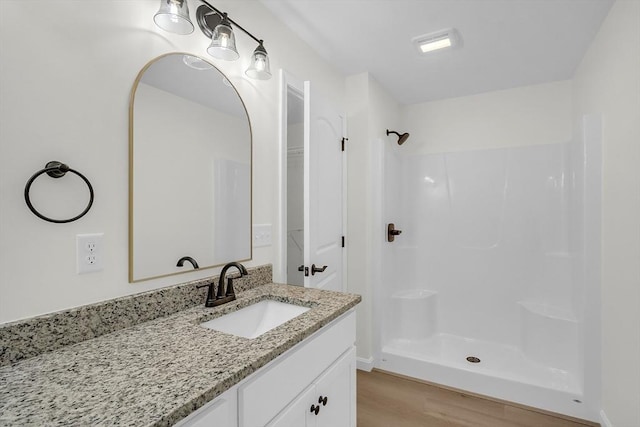 L-244 Doyle Ave, Winchendon, MA 01475 - full bath with wood finished floors, vanity, and a shower