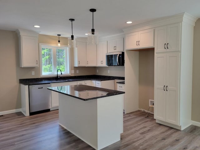 L-244 Doyle Ave, Winchendon, MA 01475 - kitchen with stainless steel appliances, white cabinets, recessed lighting, light wood-type flooring, and a center island