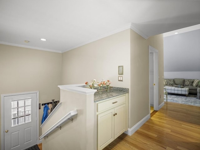 10 Robinhood Rd, Tyngsborough, MA 01879 - laundry area with light wood finished floors, crown molding, baseboards, and recessed lighting