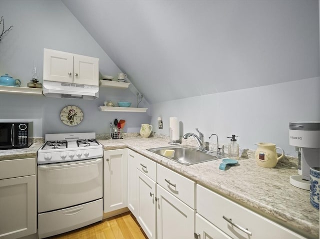 10 Robinhood Rd, Tyngsborough, MA 01879 - kitchen with white range with gas stovetop, under cabinet range hood, a sink, open shelves, and lofted ceiling