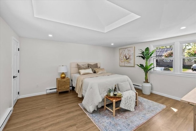 7 Curran Ter, Randolph, MA 02368 - bedroom featuring baseboard heating, wood finished floors, recessed lighting, and baseboards