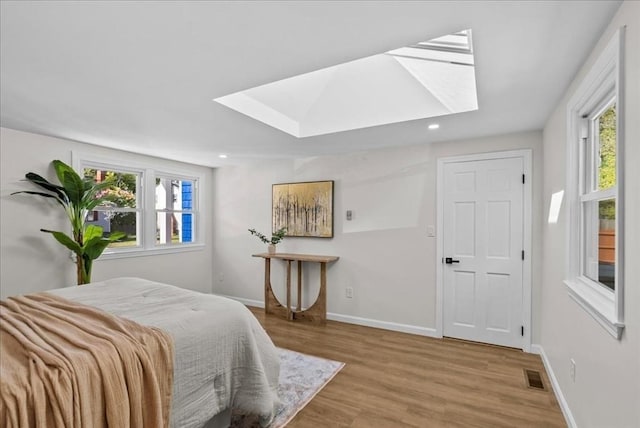 7 Curran Ter, Randolph, MA 02368 - bedroom featuring a skylight, recessed lighting, wood finished floors, and baseboards