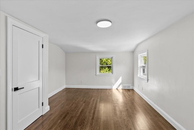 7 Curran Ter, Randolph, MA 02368 - empty room featuring dark wood-style flooring and baseboards