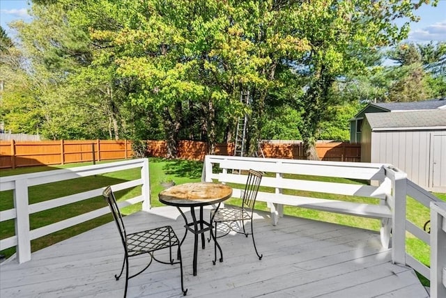 7 Curran Ter, Randolph, MA 02368 - deck with a storage shed, an outdoor structure, and outdoor dining space