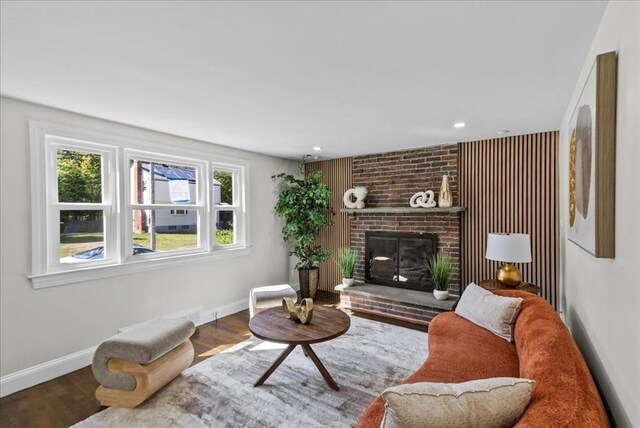 7 Curran Ter, Randolph, MA 02368 - living area featuring wood finished floors, baseboards, a fireplace, and recessed lighting