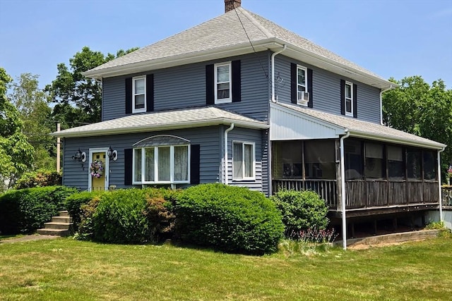 96 Robinson Ave, Attleboro, MA 02703 - view of front of house with a chimney, a sunroom, a front lawn, and roof with shingles