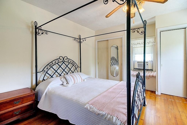 96 Robinson Ave, Attleboro, MA 02703 - bedroom featuring cooling unit, hardwood / wood-style flooring, and ceiling fan