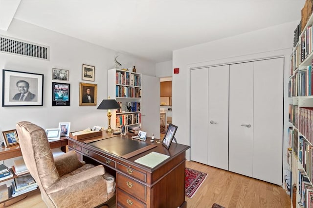80 Broad St Unit 1002, Boston, MA 02110 - office with visible vents and light wood-style floors