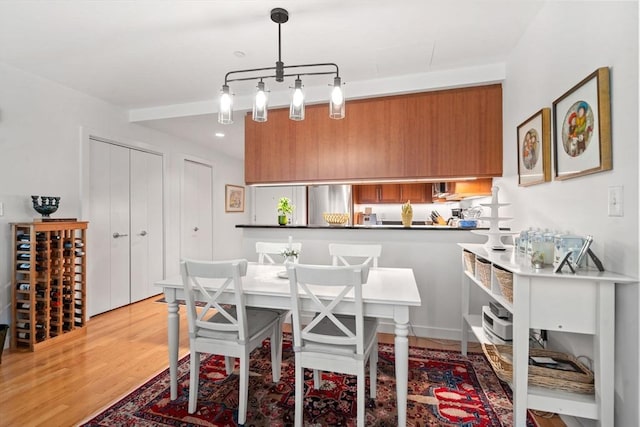 80 Broad St Unit 1002, Boston, MA 02110 - dining area featuring light wood-style flooring