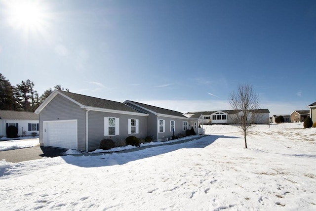 single story home with a garage