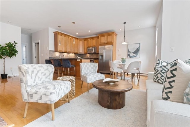 living room featuring recessed lighting and light wood-type flooring