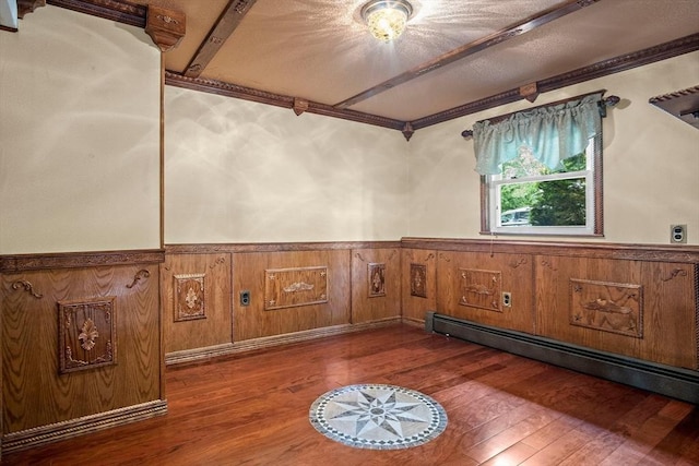 12 Cassidy Dr, Woburn, MA 01801 - detailed view of wainscoting, wood finished floors, crown molding, and baseboard heating