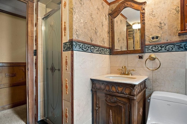 12 Cassidy Dr, Woburn, MA 01801 - bathroom featuring wainscoting, a stall shower, toilet, and vanity