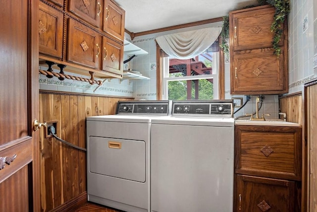 12 Cassidy Dr, Woburn, MA 01801 - laundry area featuring cabinet space, independent washer and dryer, and wooden walls