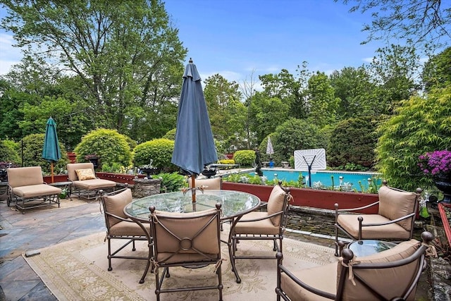 12 Cassidy Dr, Woburn, MA 01801 - view of patio / terrace featuring an outdoor pool and outdoor dining area