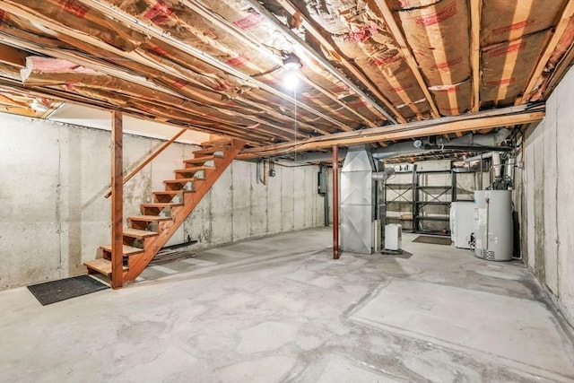 basement with washer / dryer and water heater