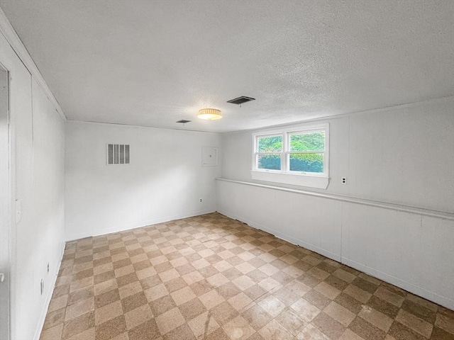 spare room featuring tile patterned floors