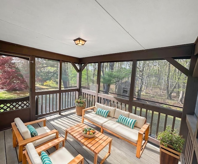 sunroom / solarium with an outdoor hangout area