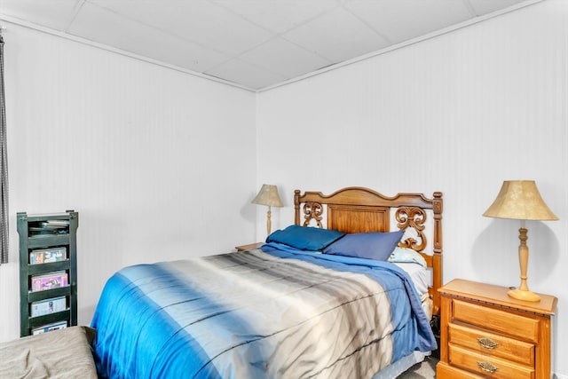 bedroom with a paneled ceiling