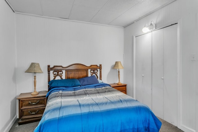 carpeted bedroom featuring a closet