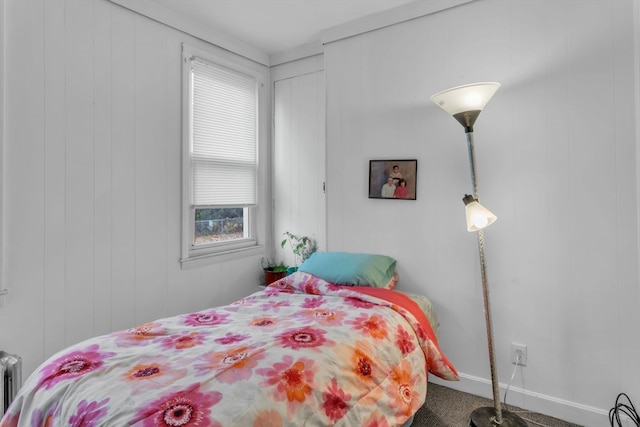 bedroom featuring radiator heating unit